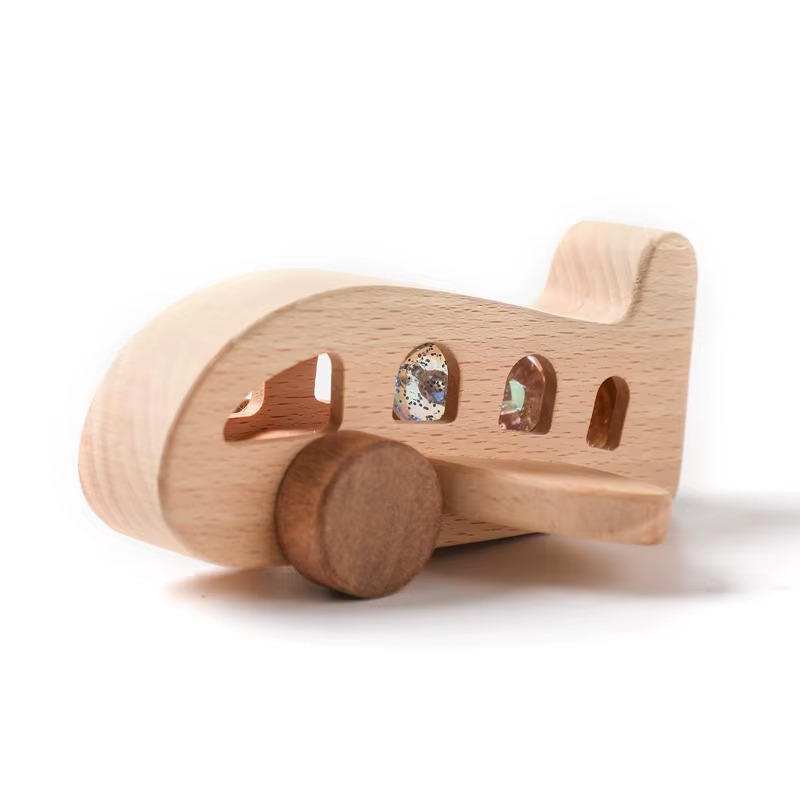 Natural wood Montessori airplane toy, perfect for encouraging creative play and fine motor skills