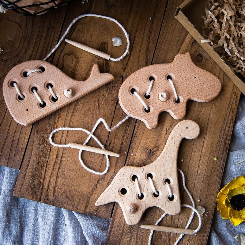 Unisex wooden Montessori lacing toy with a colorful large bead, perfect for developing fine motor skills.
