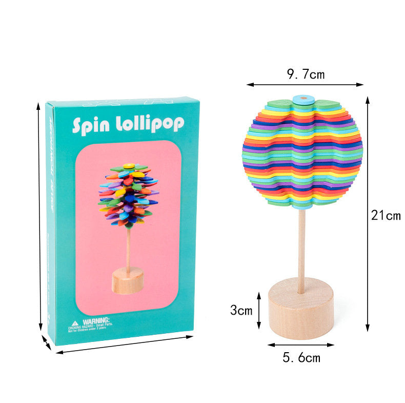 Hand holding a wooden rotating fidget toy, portable stress relief for all ages