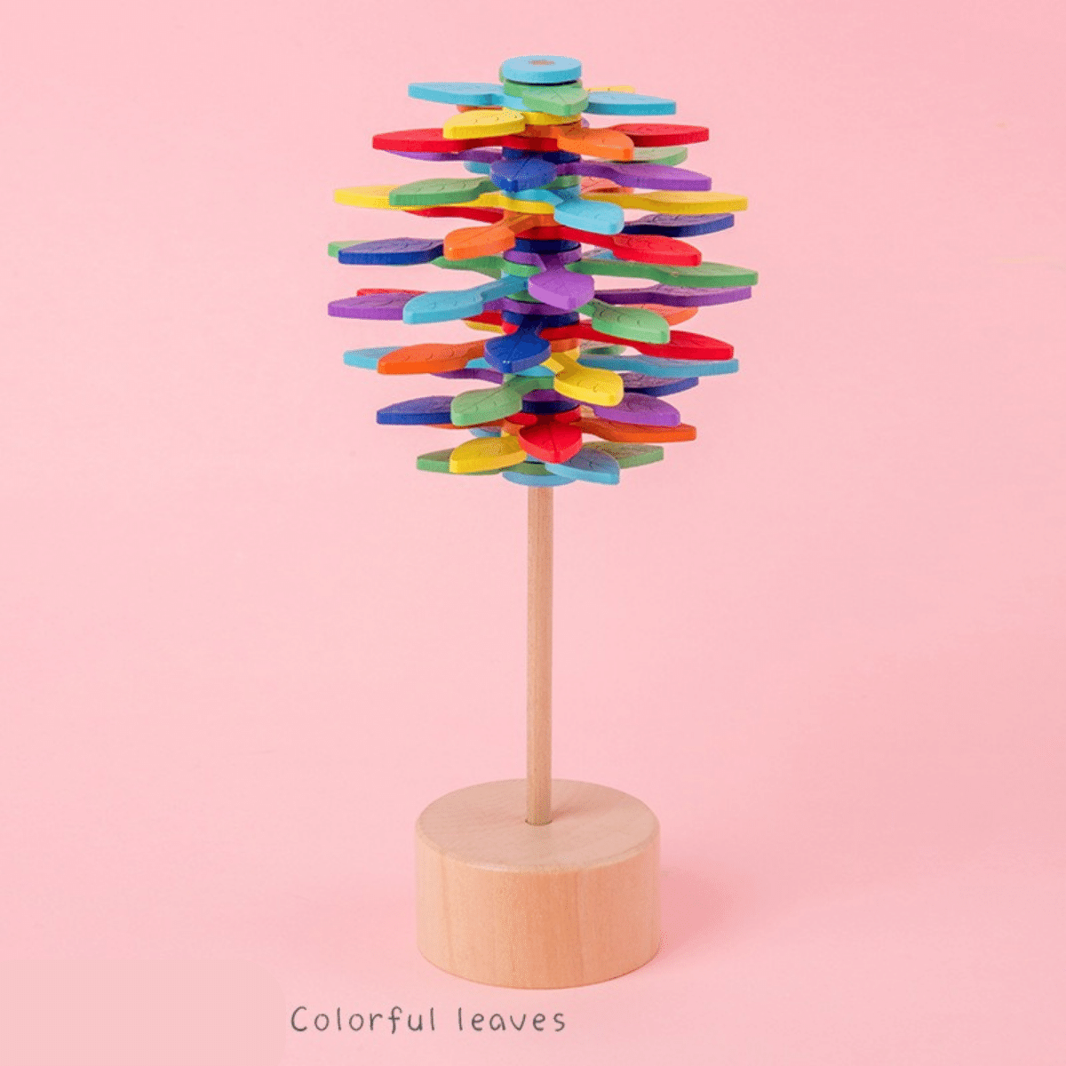 Child's hands playing with a smooth wooden rotating stress reliever toy, educational & calming