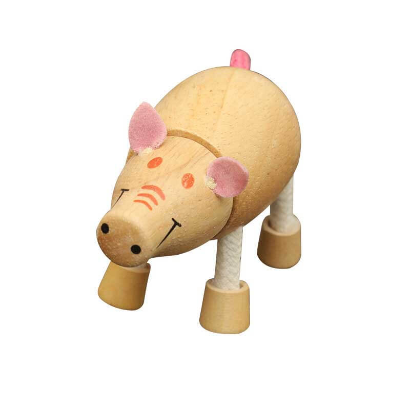 Preschooler engaging with wooden farm animals, enhancing cognitive and motor skills with educational toys