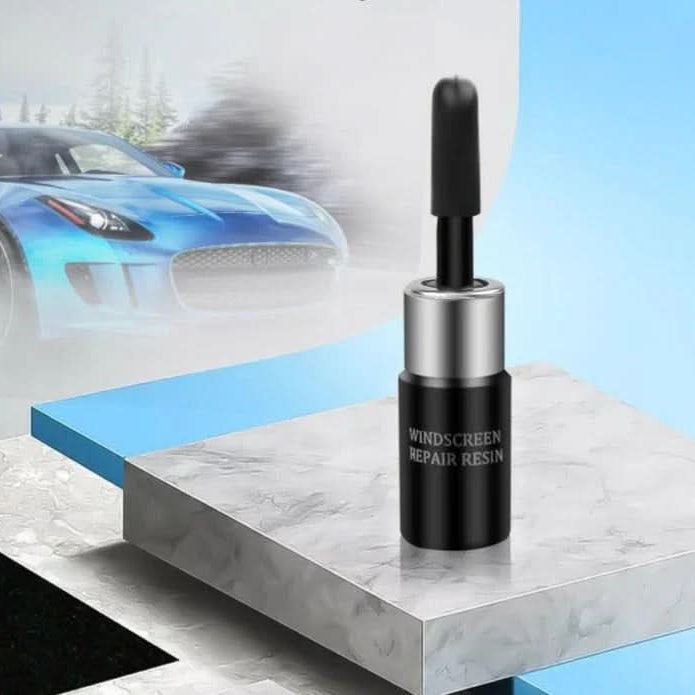 Complete auto glass repair kit with resin, applicator, & curing strips for DIY windshield chip & crack fix.