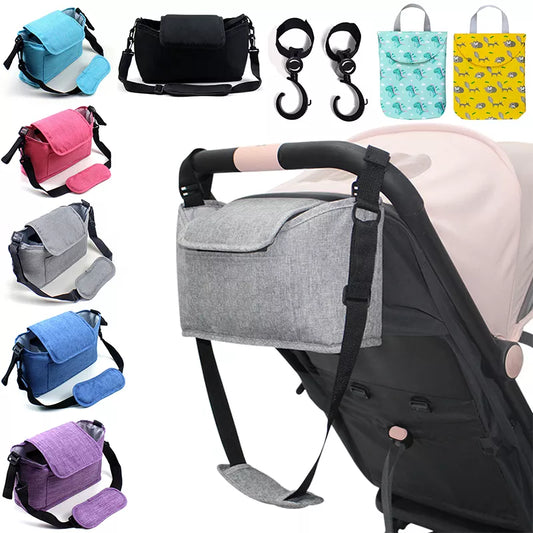 Universal stroller organizer bag, linen with accessories, attached to a baby stroller.