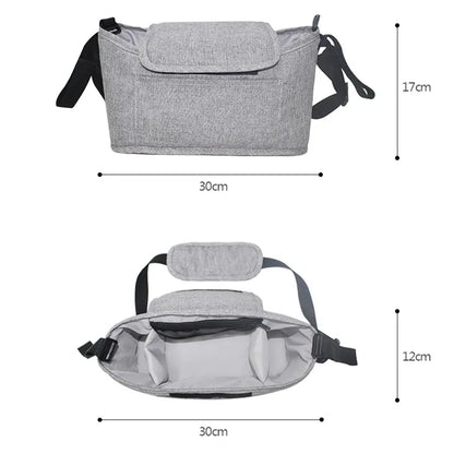 Stylish universal stroller bag in natural linen, holding baby essentials and accessories.