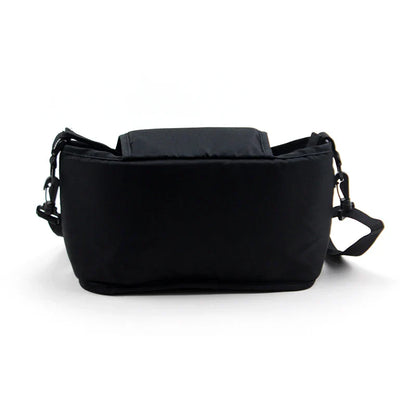 Stroller organizer showing its spacious interior, perfect as a diaper bag alternative.