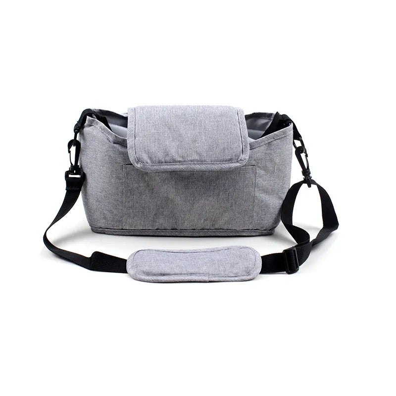 Front view of a versatile linen stroller organizer, suitable for various stroller types.