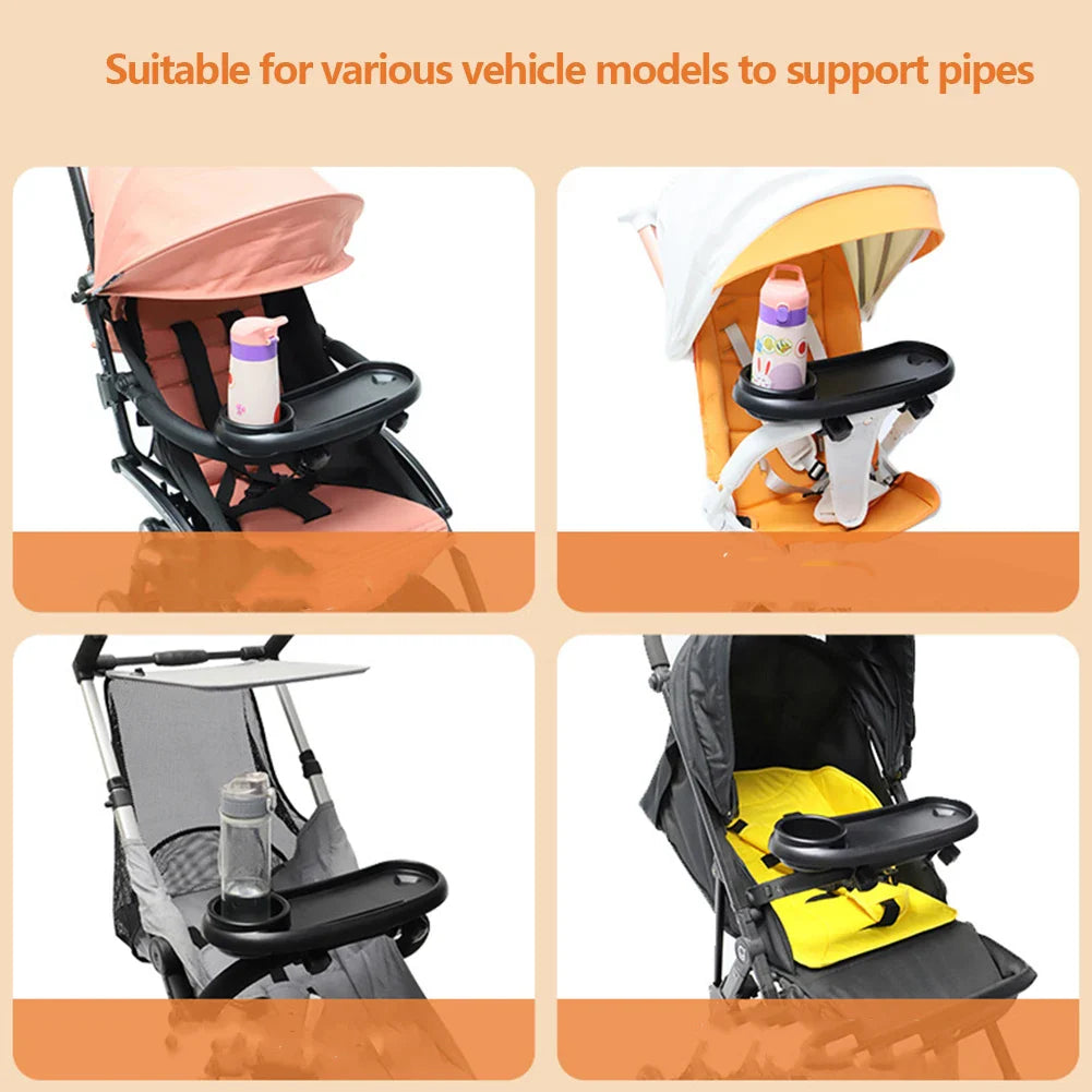 Baby accessory: black universal stroller tray featuring a deep snack compartment and drink holder.