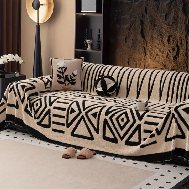 Urban Maze sofa cover, modern jacquard design, protects living room couch, stylish decor.