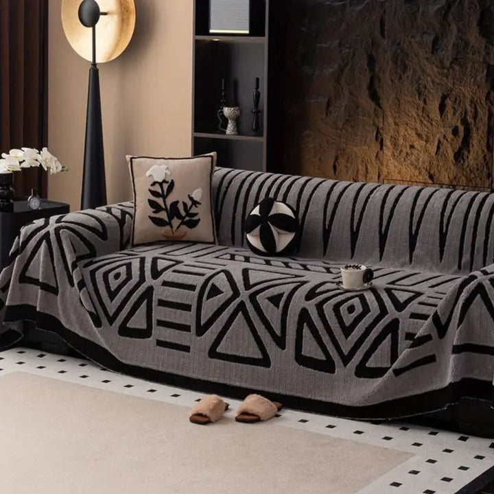 Washable non-slip sofa cover, microfiber jacquard, durable furniture protector for modern homes.