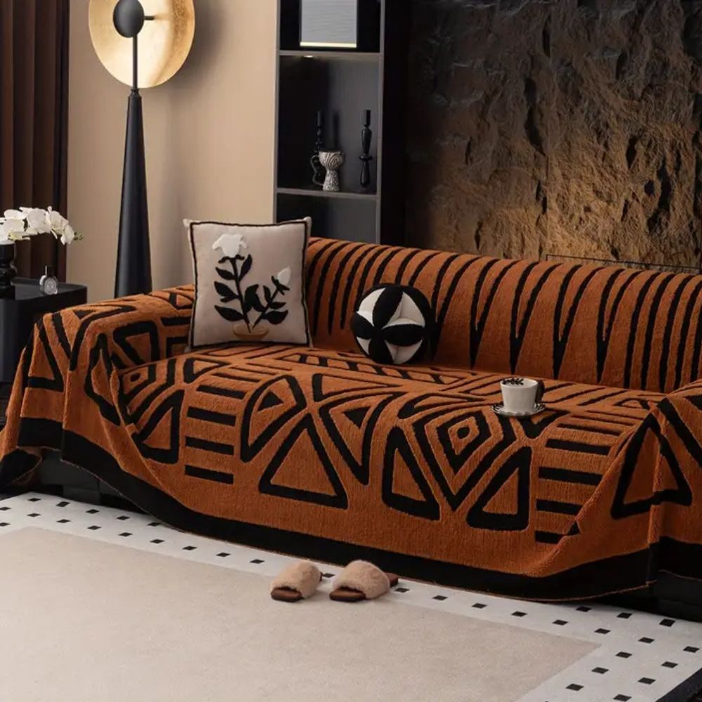 Microfiber jacquard sofa cover, protective & non-slip, keeps modern home furniture safe from spills.