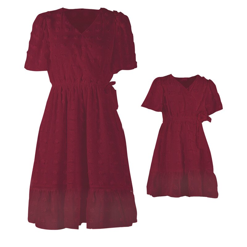 Stylish V-neck short sleeve mother daughter dresses in soft polyester, perfect for warm weather