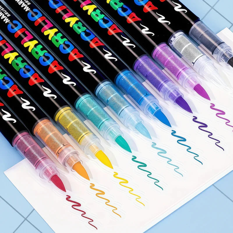 Hand holding a purple acrylic brush tip marker, ready for multi-surface painting and drawing.