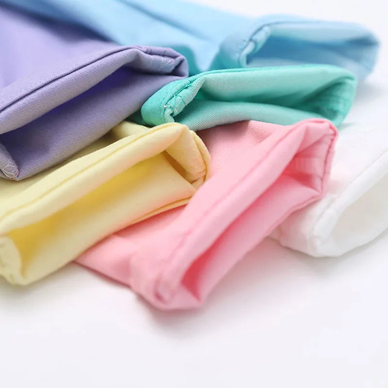 Cute girls' vibrant pencil pants, candy-colored, featuring a cozy elastic waist for active kids.