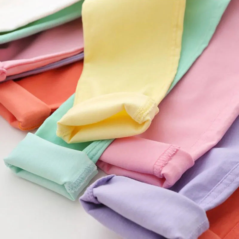 Fashionable girls' child clothing: candy-colored pencil pants with an easy elastic waist.