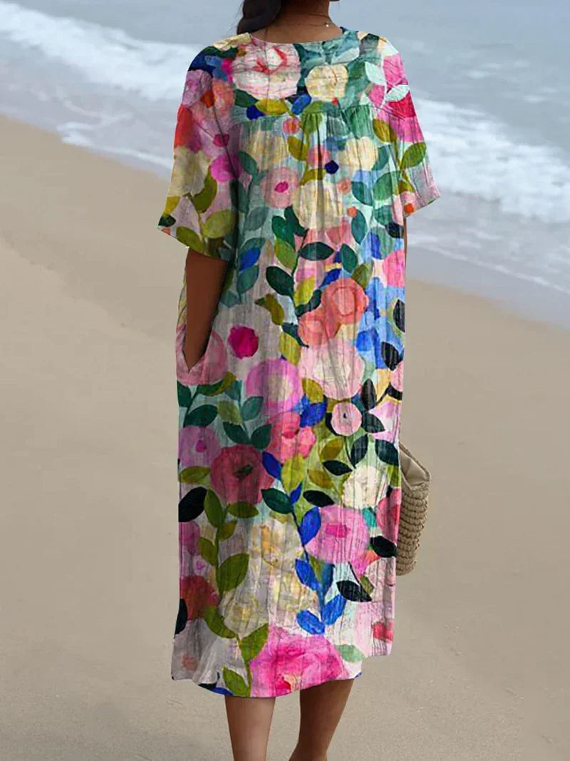 Effortless women's flowy floral garden print dress with relaxed fit, ideal for summer fashion & feminine style.