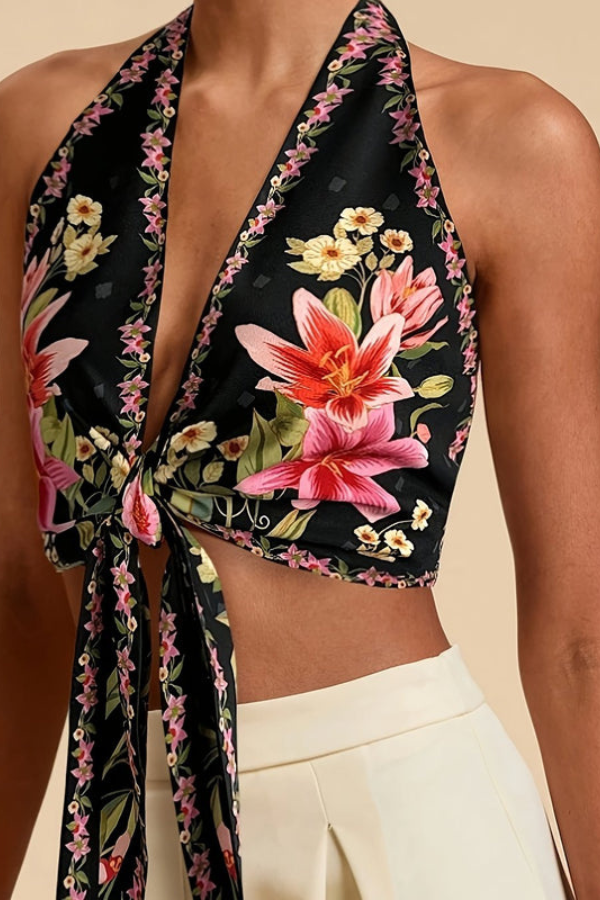 Front view of a women's vibrant floral halter top, perfect for casual summer outings.