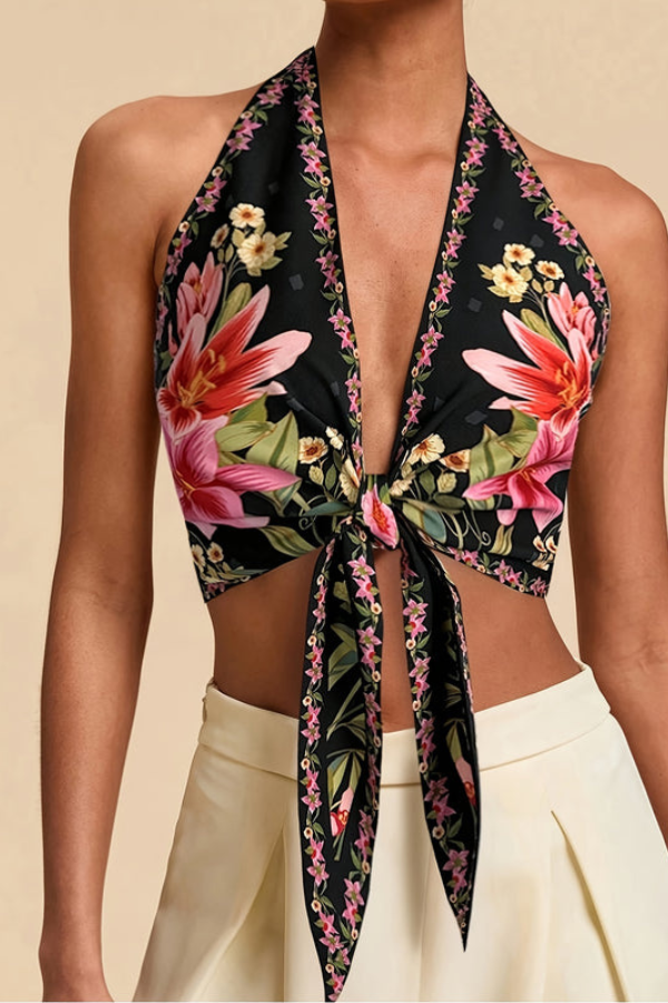 Women's halter top with a bright, eye-catching floral print. Excellent for tropical vacations.