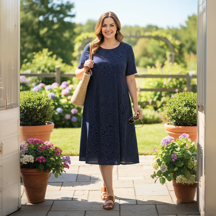 Vibrant floral short summer dress for women, comfortable & flowy midi style, perfect for casual or party wear.
