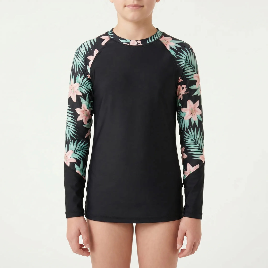 Comfortable long-sleeve rash guard for girls. Vibrant children's swim top for all-day sun protection.