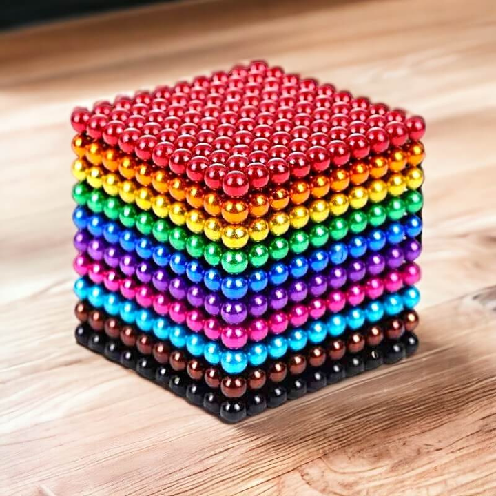 Kids playing with a colorful magnetic ball set, building structures; excellent educational brain teaser & stress relief toy.