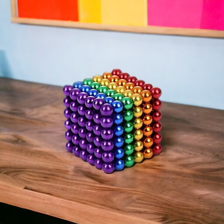 Multicolor magnetic balls construction set, ideal for creative building, STEM learning, and sensory fidget play for kids.