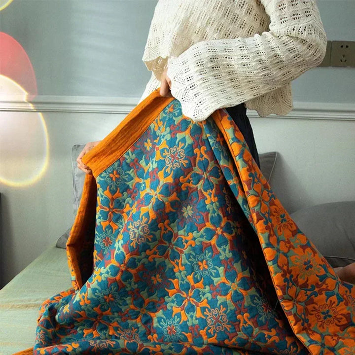 Modern orange & blue cotton quilt. Stylish six-layer duvet adds a vibrant touch to any bedroom home decor.
