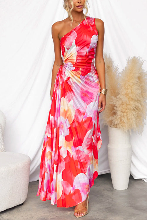 Elegant women's printed gown featuring a vibrant pattern, one-shoulder design, and stylish asymmetric hem.