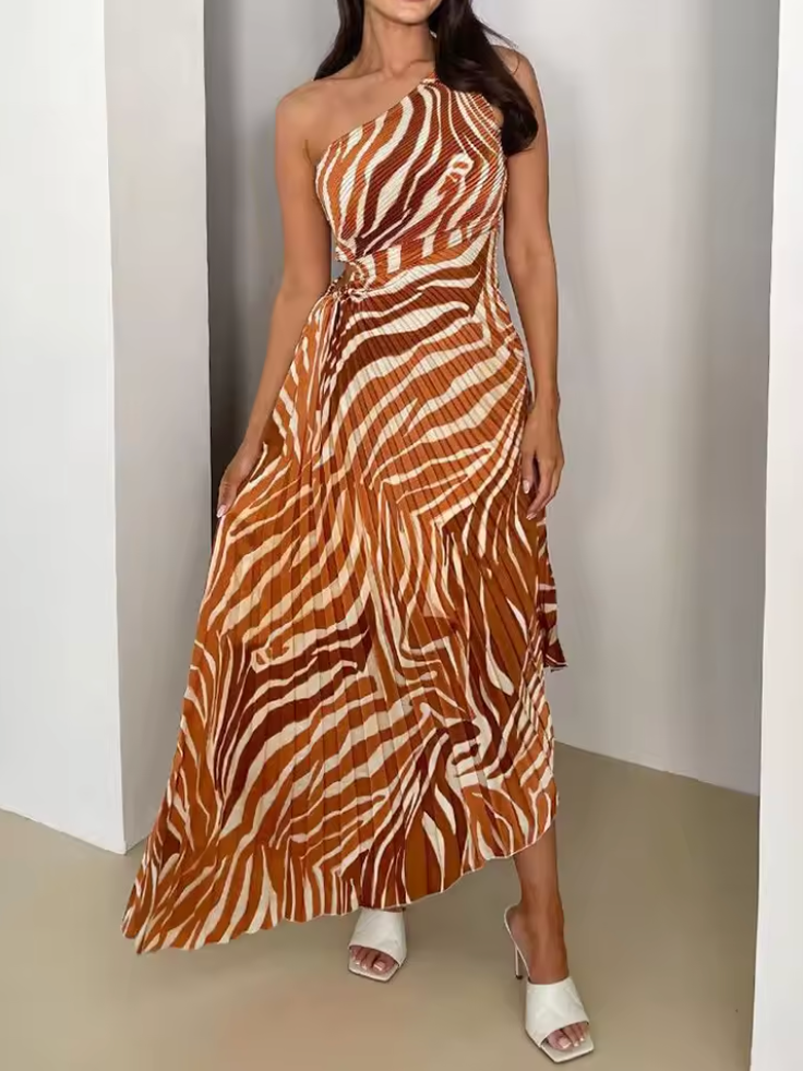 Chic women's vibrant printed gown, one-shoulder design & asymmetric hem, perfect for wedding guests.