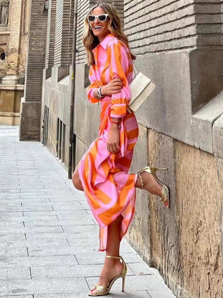 Stylish women's wrap dress featuring a vibrant print. Ideal for a chic, casual, or elegant look.