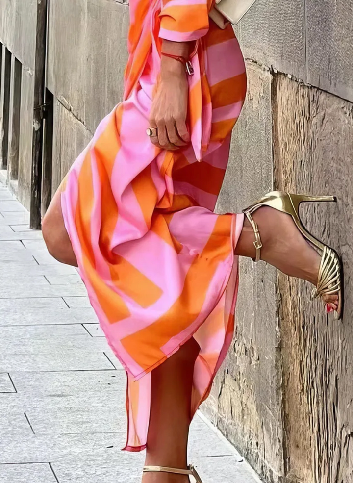 Effortless style: women's vibrant printed wrap dress. Perfect for summer fashion trends.
