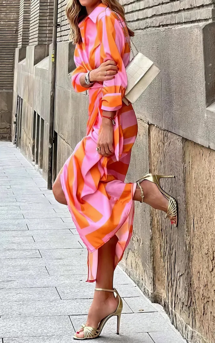 Vibrant print wrap dress, collared. Women's effortless style, great for summer sales.