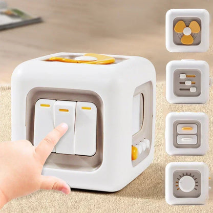 Vibrant sensory activity cube for toddlers, promoting fine motor skills with various textures and shapes.