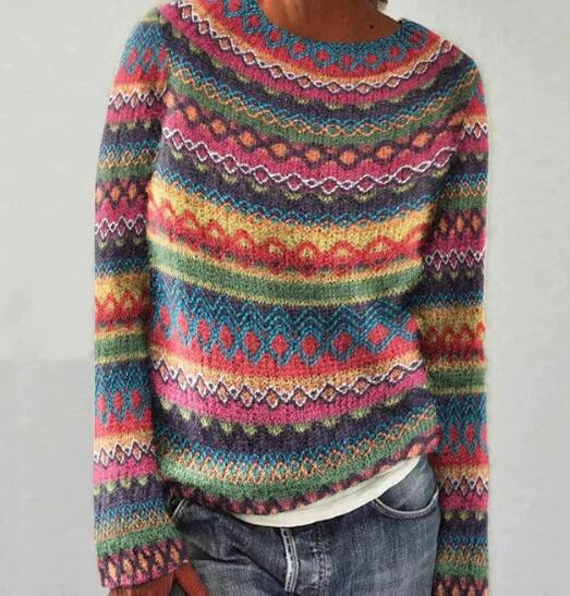 Women's vibrant striped loose fit pullover sweater with round neck. Cozy and comfortable top, ideal for casual autumn fashion.