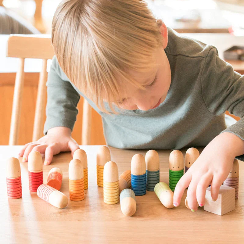 Complete kids wooden rainbow block playset featuring various arched shapes for creative building