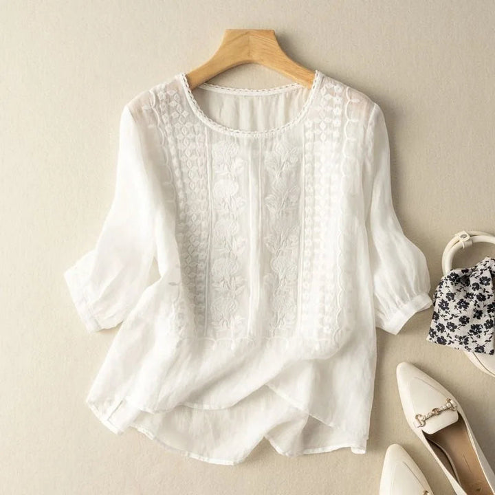 Feminine vintage embroidered blouse for women, featuring trendy sheer puff sleeves & a relaxed fit.