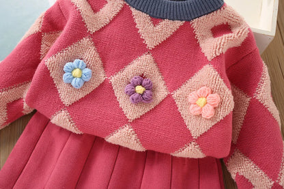 Little girl modeling a comfortable cotton blend vintage knitted pullover and skirt outfit, fall fashion.