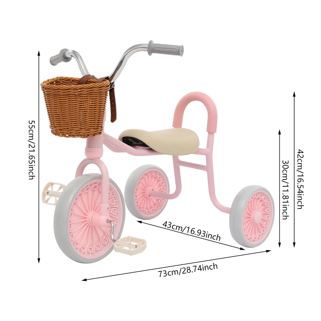 Group of colorful vintage tricycles for kids, red, blue, and green, with baskets for outdoor play