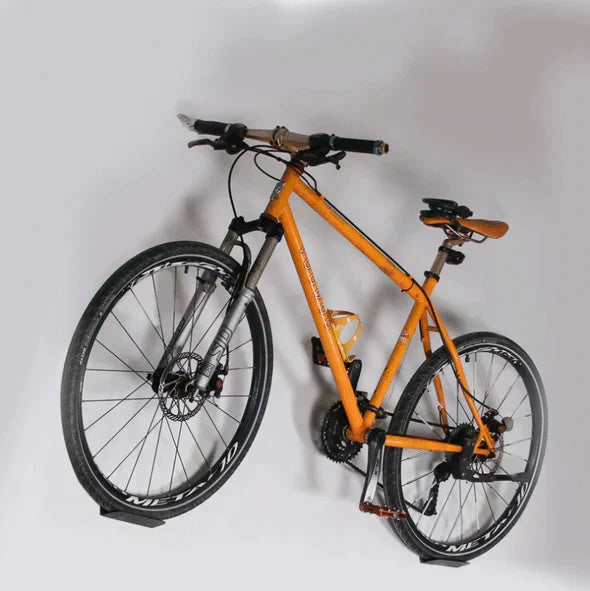 Heavy-duty wall mount bike rack for efficient garage organization and home storage of bicycles.