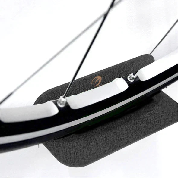 Durable carbon steel wall bike rack, ideal for garage organization and space-saving bicycle storage.