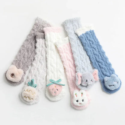 Infant apparel: extra warm long cotton socks with anti-slip grip for active babies.