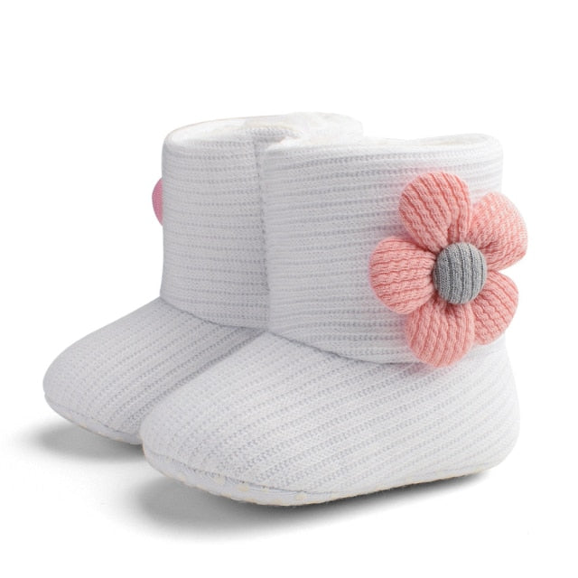 Close-up of cozy baby winter boots, perfect for newborns, with an anti-slip sole for safety