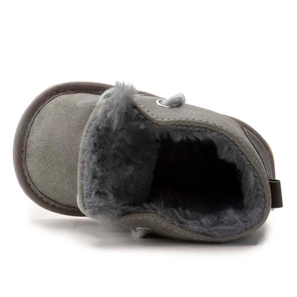 Durable baby footwear: warm crib shoes with non-slip sole for safe toddler play.