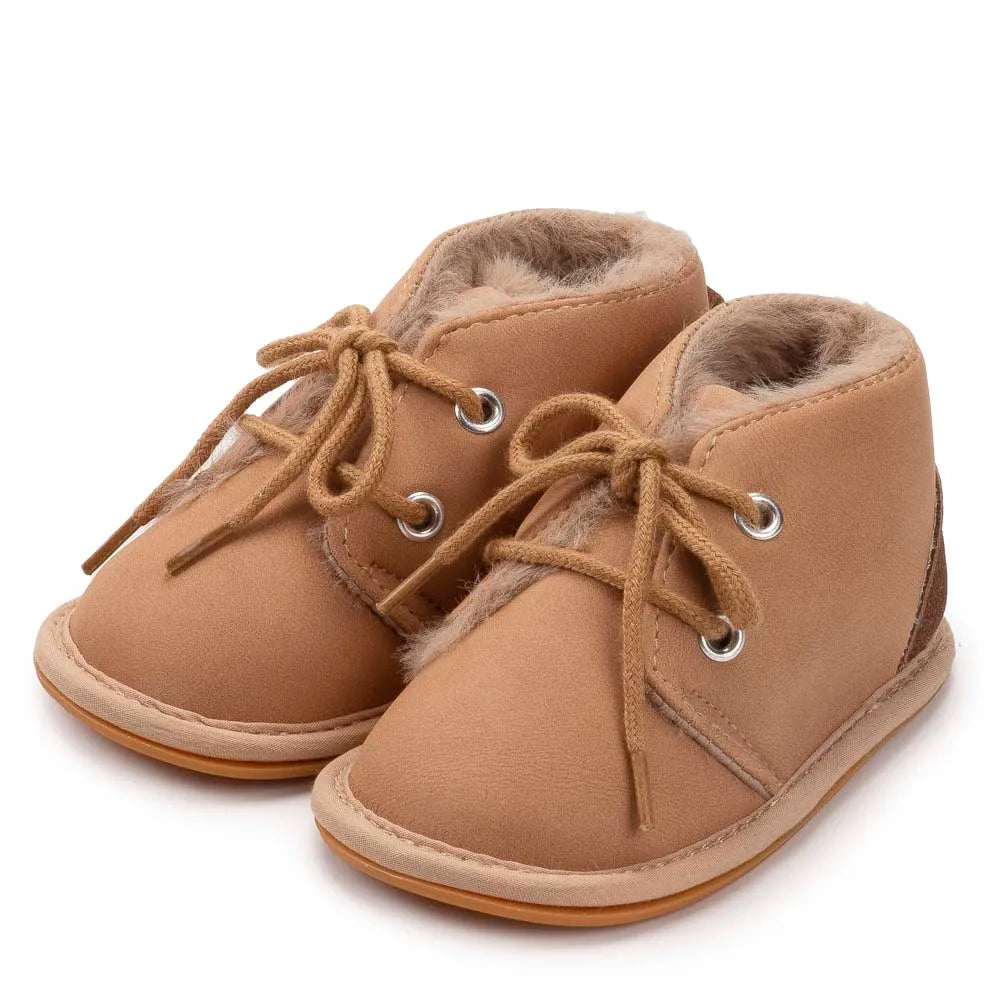 Warm baby slippers, functioning as crib shoes with non-slip grip for young children.