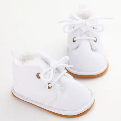 Cozy toddler crib shoes in a charming design, suitable for baby fashion and cold weather.