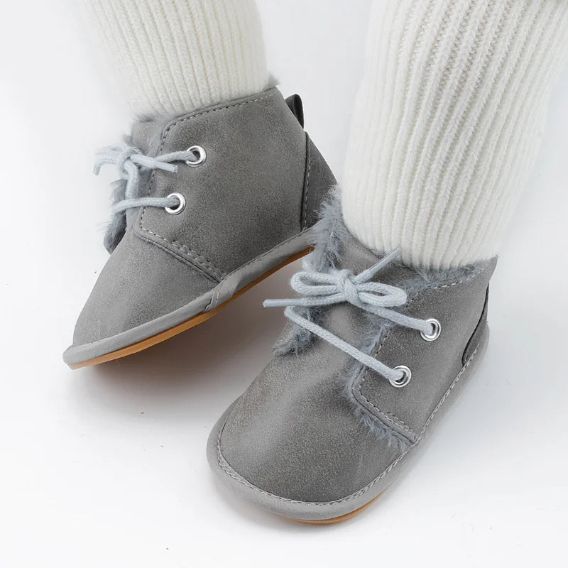 Non-slip baby winter shoes, designed for warmth and stability for active toddlers.