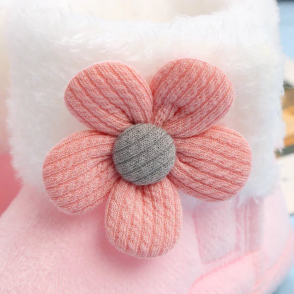 Infant footwear: soft sole baby boots with charming flower design, ideal for winter