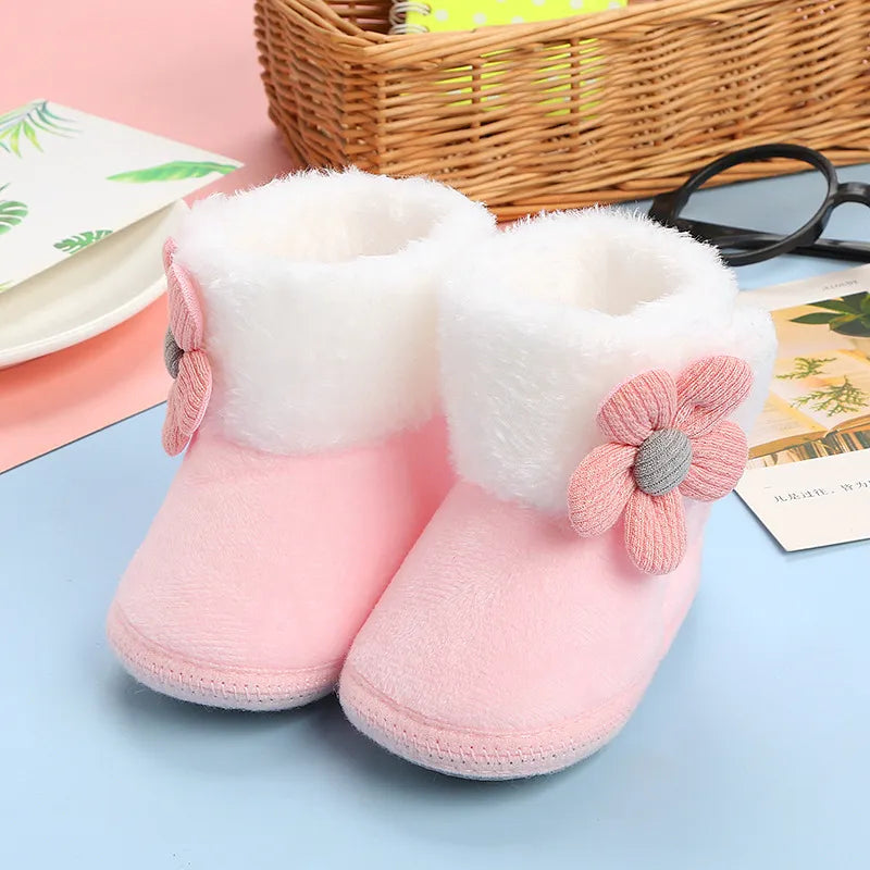 Adorable baby girl winter boots with flower print, keeping little feet warm and cozy
