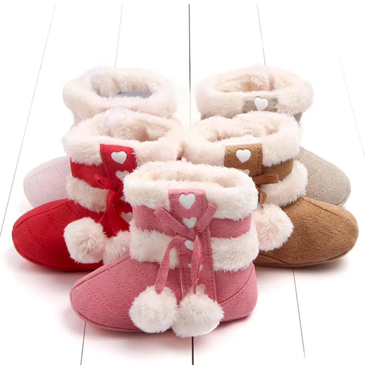 Warm baby winter snow boots made of soft polyester for cozy infant feet, slip-on design
