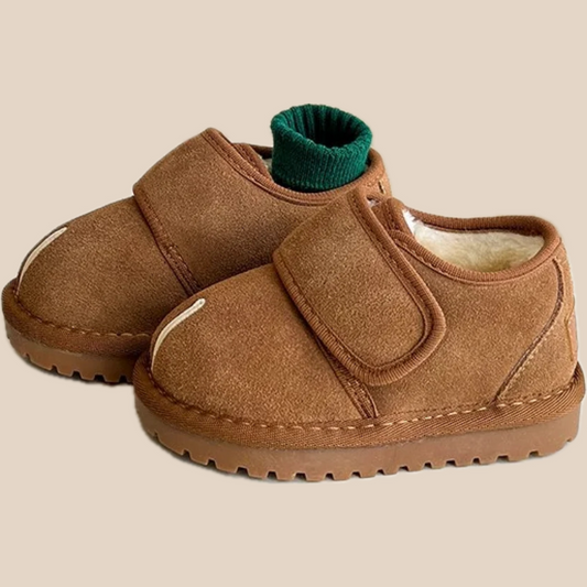 Warm black kids' winter boots with Velcro, perfect for toddler adventures in snow.