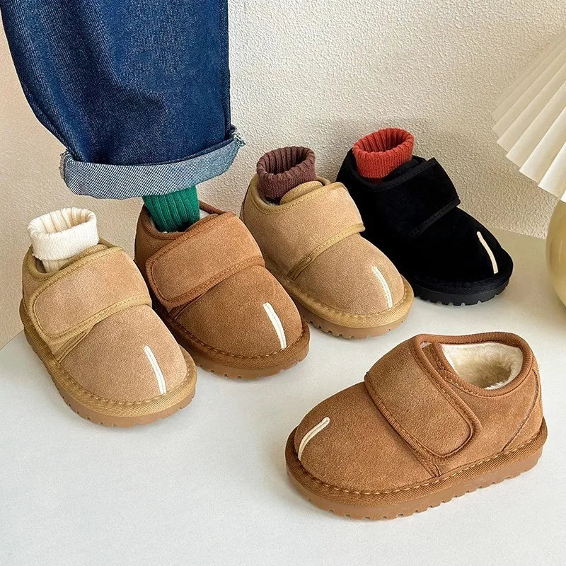 Durable black children's winter boots with non-slip sole and convenient Velcro straps.